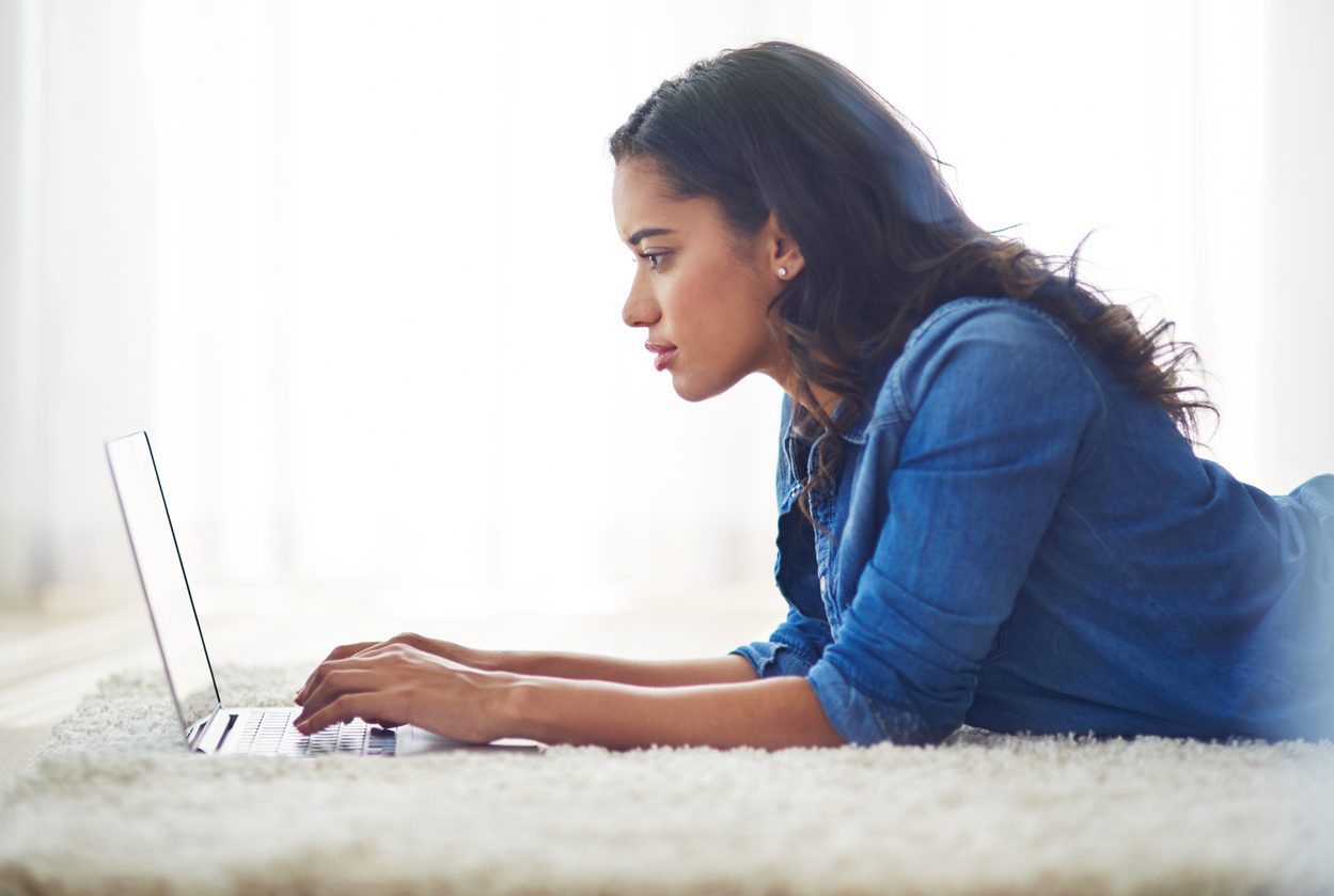 Woman with laptop, update older blogs